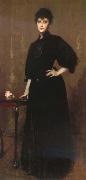 The woman wear the black William Merritt Chase